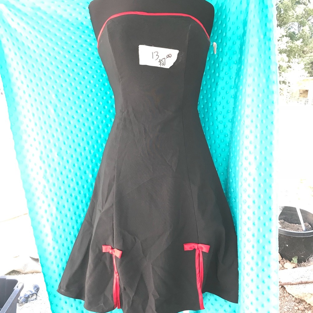 Strapless with peek a boo petticoat size 13